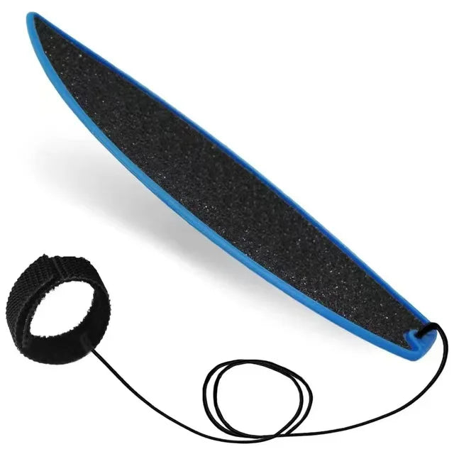 A black and blue mini finger surfboard skateboard toy with a string attached.