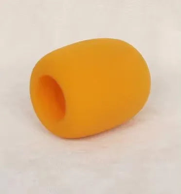 A smooth, yellow foam windscreen pop filter cover for a professional microphone.