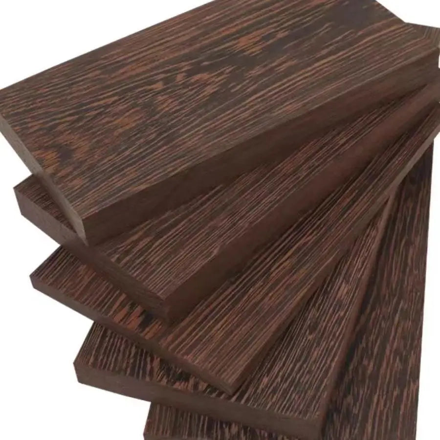 Stack of dark brown natural African Wenge hardwood blanks for carving and handle crafting