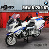 A white BMW R1250 RT police motorcycle model in 1:18 scale on a display stand.