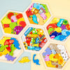 A wooden 3D jigsaw puzzle featuring colorful animal shapes arranged in hexagonal compartments.