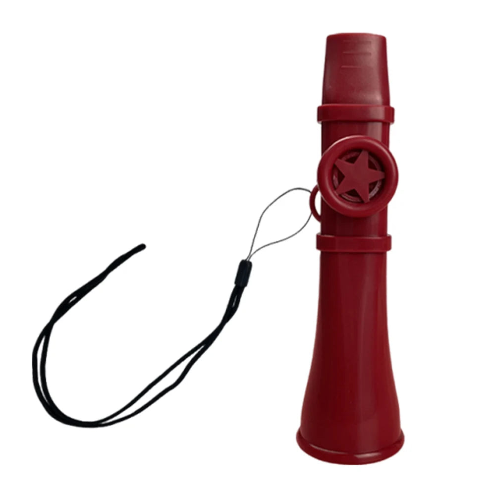 A red portable kazoo flute with a lanyard attached to the end.