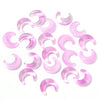 A collection of pink moon-shaped glass beads for DIY jewelry making