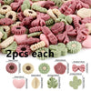 A variety of pink and green silicone flower and leaf beads for jewelry making are shown in loose piles and individual example