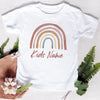 White t-shirt featuring a rainbow graphic and the text Kids Name printed on the front