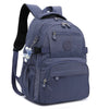 Sac de voyage bleu marine et durable avec sangles noires et un charm argenté.