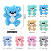A collection of silicone bear beads in various colors including turquoise, sky blue, brown, mint, and gray for jewelry making