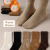 A collection of women's fleece-lined slouch socks in various neutral and dark earth tones displayed on a light background.