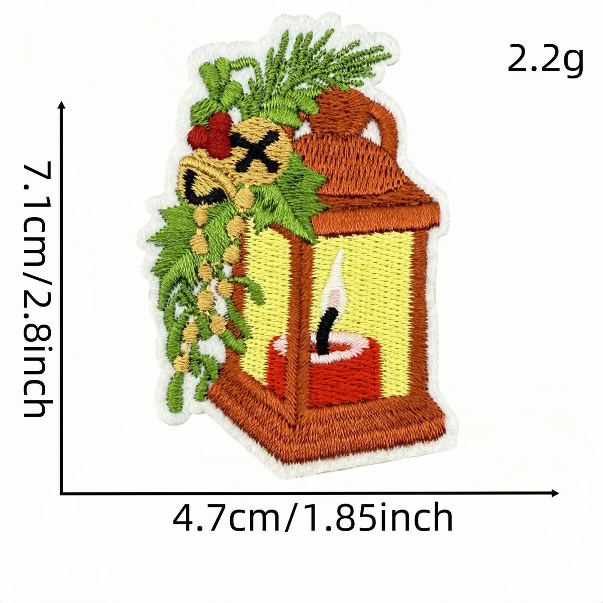 An iron-on patch depicting a cartoon character inside an old lantern with a lit candle and surrounded by green foliage.