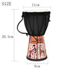 A black hand drum with a colorful, patterned base and white top, shown with size measurements.