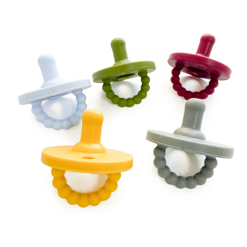 Colección de chupetes o calmantes para bebé de silicona apta para alimentos en varios colores como azul claro, verde, morado 