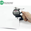 A hand is using a digital thickness gauge to measure the 0.4mm thickness of a flexible magnetic dry erase board.