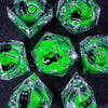 A collection of vibrant green liquid core resin dice set with sharp edges displayed on a dark surface.