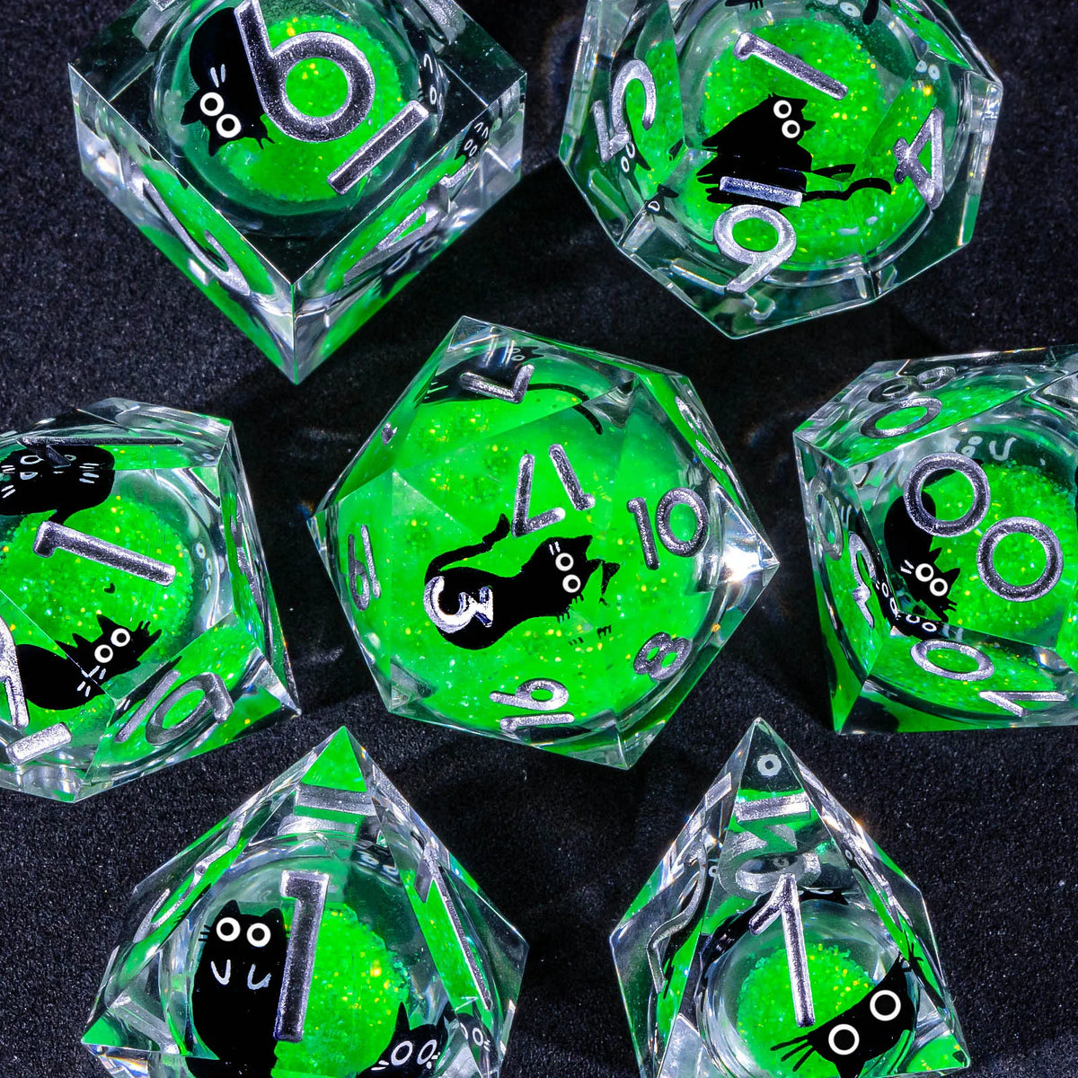 A collection of vibrant green liquid core resin dice set with sharp edges displayed on a dark surface.