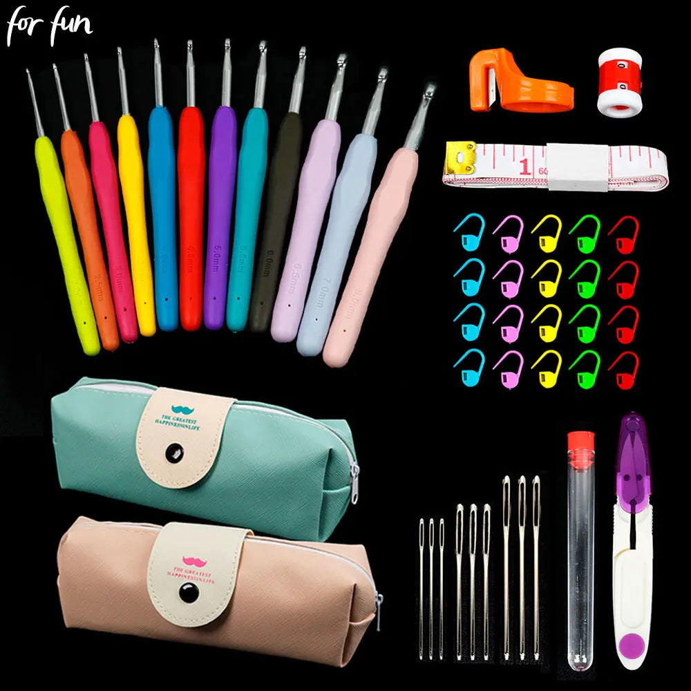 A collection of crochet hooks and knitting needles in various colors, along with storage bags and measuring tools.