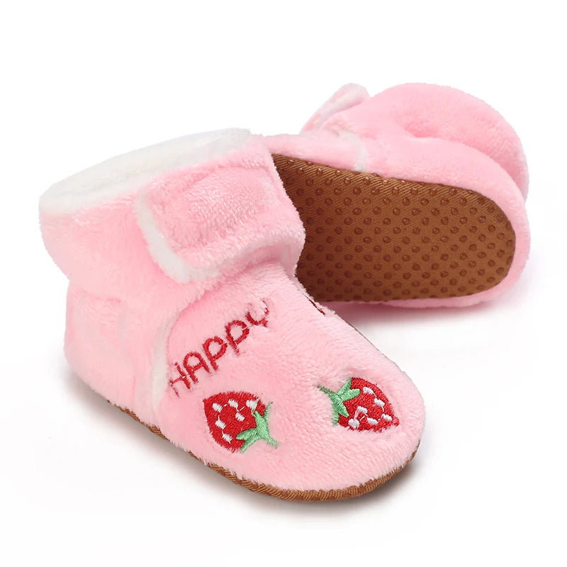 Pink fuzzy baby first walker shoes decorated with strawberry patterns