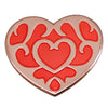 A heart-shaped enamel pin brooch featuring a red and pink floral design.