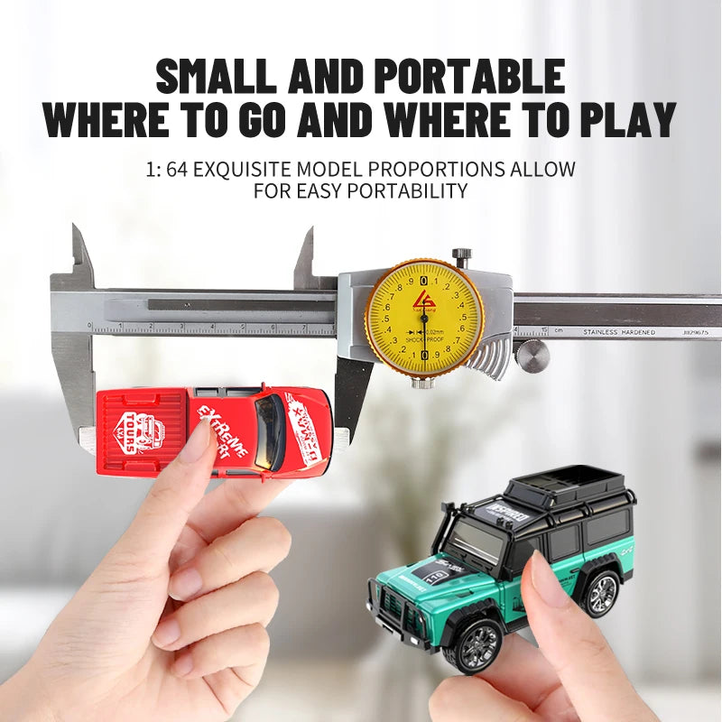 A hand holds a red and silver model ruler next to a green mini alloy RC car.