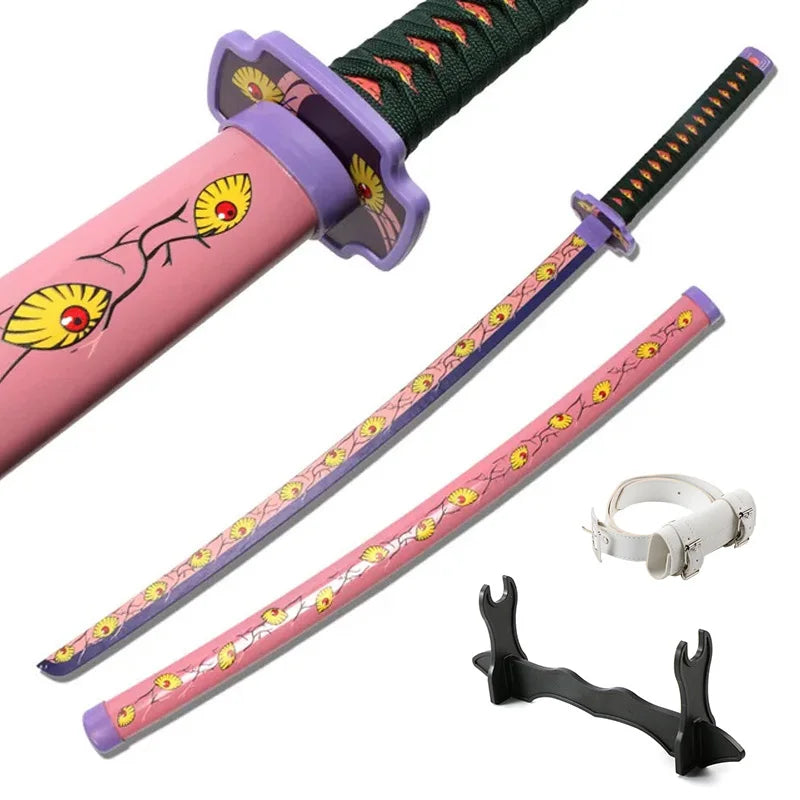 A pink and purple Demon Slayer anime katana sword with a green grip and decorative hilt.