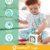 A toddler plays with a green sensory cube toy designed to stimulate curiosity, hand-eye coordination, fine motor skills, and 