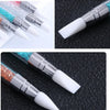 A dual-ended silicone head nail art dotting pen with a silver and crystal handle shown in various angles.