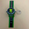 A green and black watch toy resembling the Ben 10 Omnitrix projector with a clear dome and a rectangular display panel.