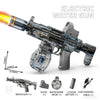 A black electric water gun is shown next to various accessories including a scope, water bomb, and lithium battery.