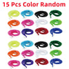 A set of 15 colorful magic worm toys on strings, including yellow, blue, black, green, and pink varieties.