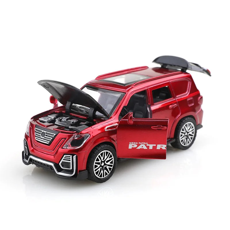 A red Nissan Patrol 1:36 scale die-cast metal SUV toy with opening doors and pull-back action.