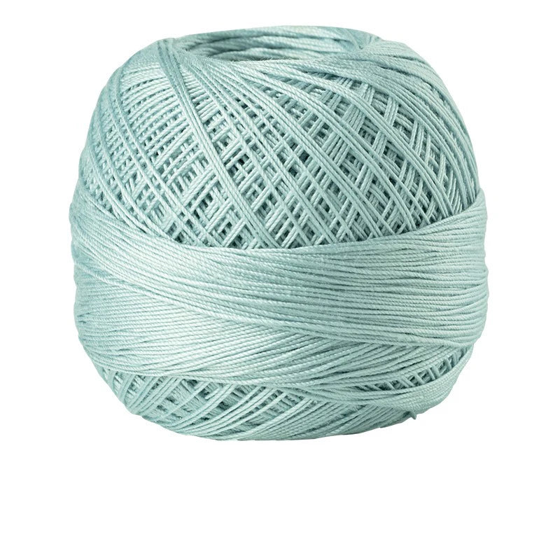 A ball of light mint green 100% cotton crochet thread for tatting and embroidery.