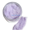 Purple adhesive flocking powder in a clear jar with loose fibers visible.
