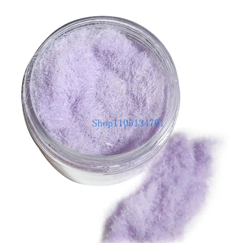 Purple adhesive flocking powder in a clear jar with loose fibers visible.