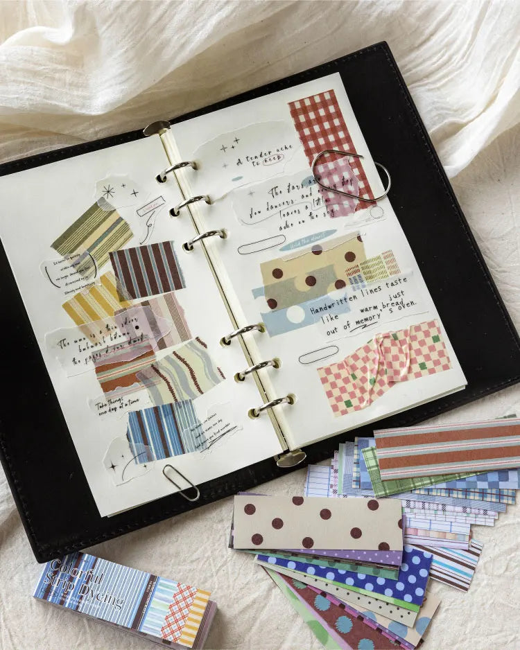 A collection of vintage washi paper sticker sheets in various grid and patterned designs for scrapbooking.