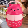 A pink bear-shaped stackable bento lunch box for kids with a pink lid and compartment.