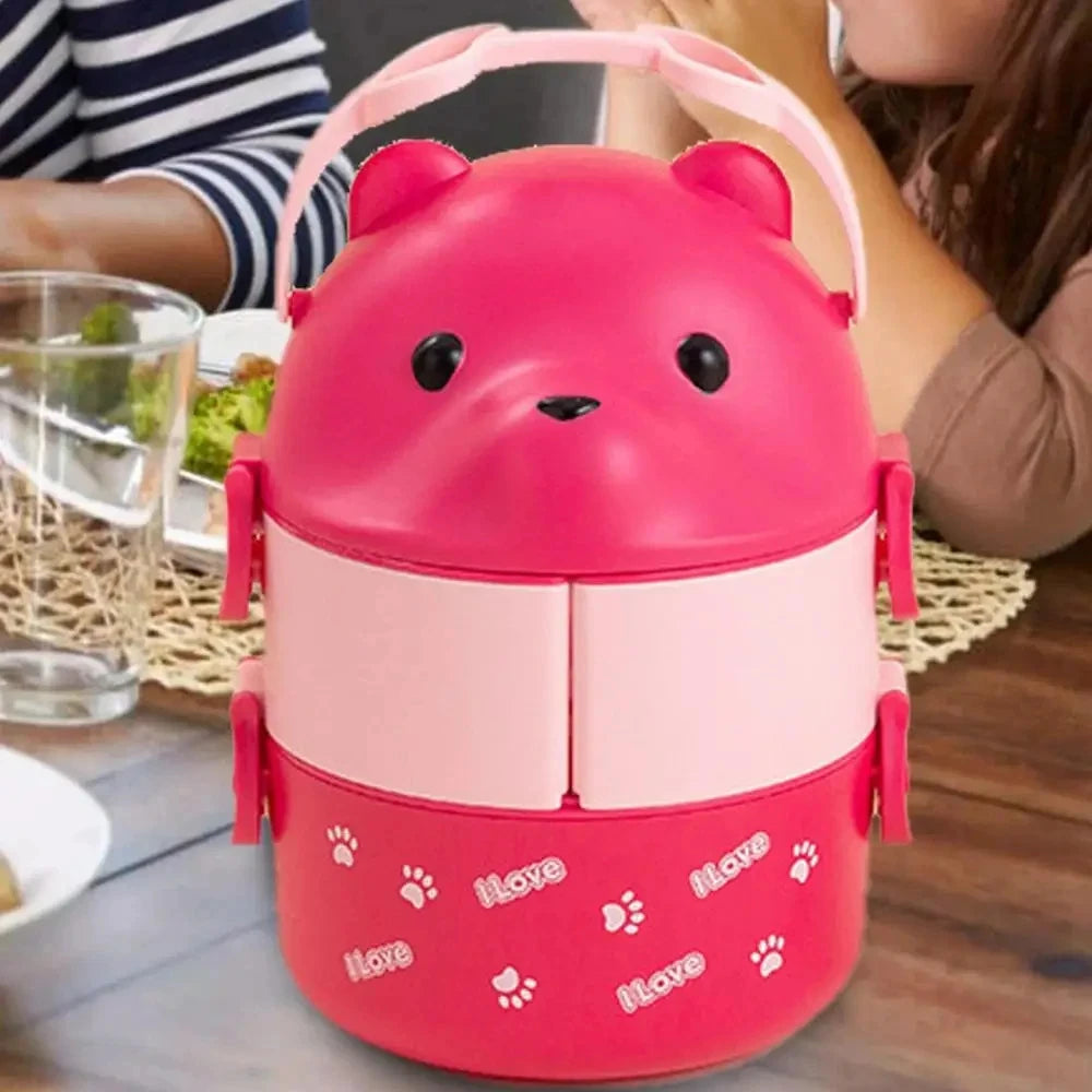 A pink bear-shaped stackable bento lunch box for kids with a pink lid and compartment.