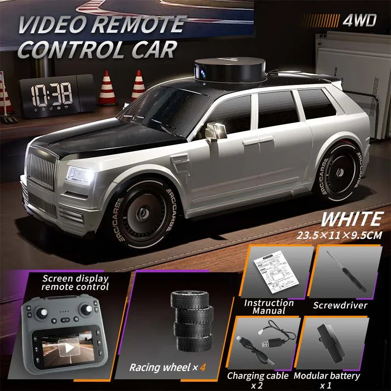 White 4WD remote control car with HD camera and FPV monitor displayed on a wooden surface.