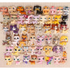 A collection of miniature pet animal figures in various colors and breeds arranged in a single row.