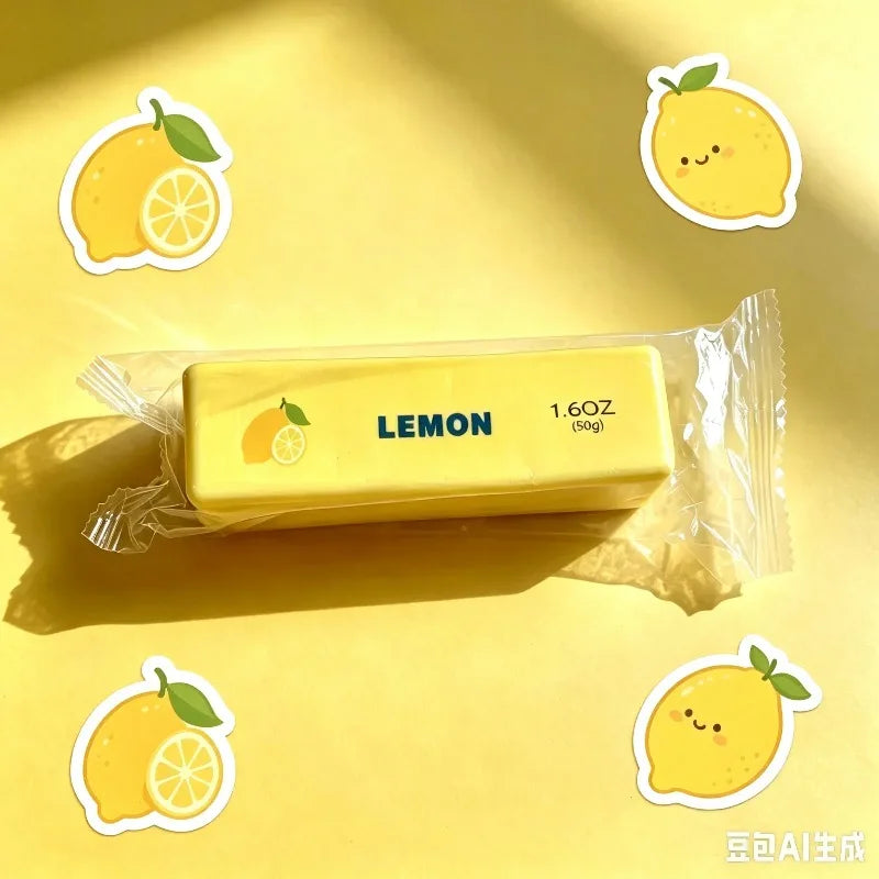 A yellow lemon-shaped squishy fidget toy in a clear plastic bag with lemon illustrations.