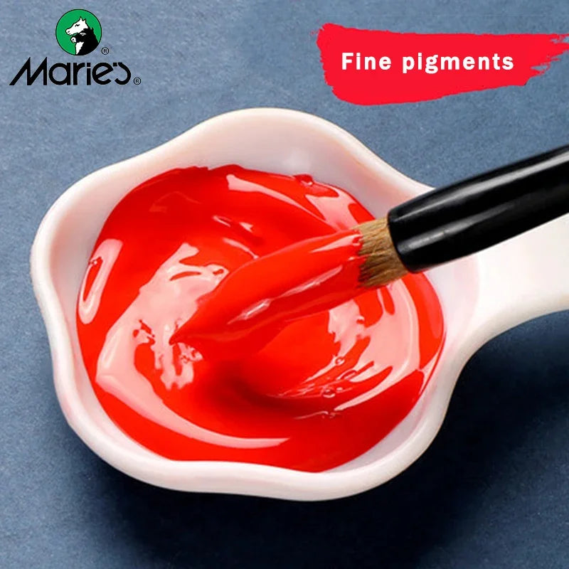 A brush applies bright red paint from a tube into a white dish, demonstrating fine pigments for Chinese painting.