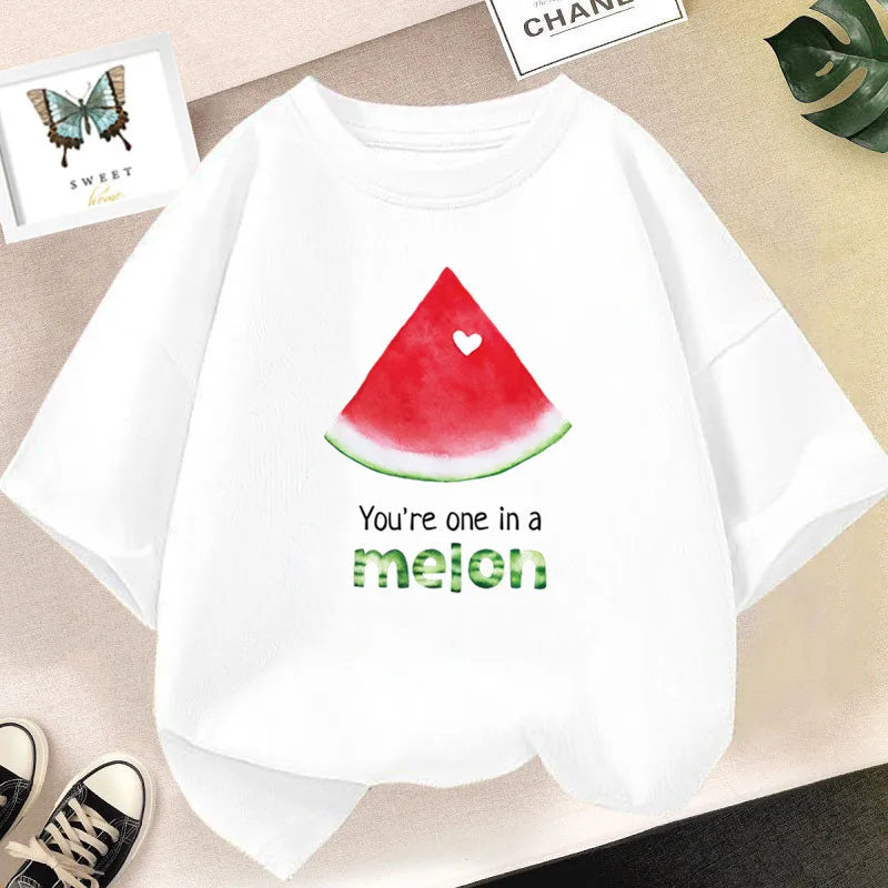 White t-shirt featuring a red watermelon slice graphic with the text You're one in a melon