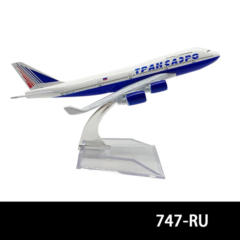 Diecast model of a Tupanog aircraft in blue and white with a clear stand.