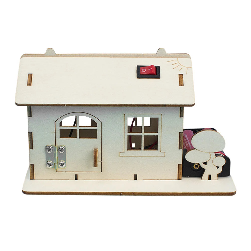 A wooden model house kit featuring a door, window, and a light switch, designed for a DIY paddle boat science project.