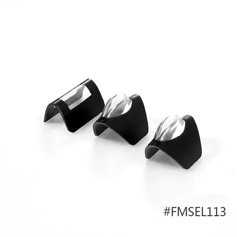 A set of black and clear replacement parts for an RC airplane engine cub.
