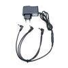 A black power supply adapter for a guitar pedal, featuring a plug and multiple cables.