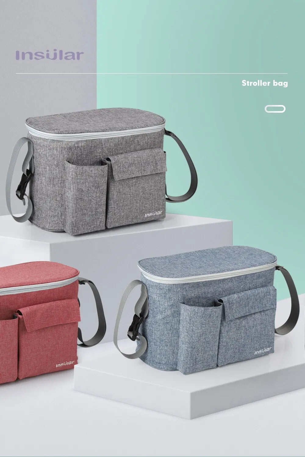 A gray Insular stroller bag with a separate organizer pouch is displayed on a white surface.