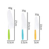 A set of plastic play knives with varying blade sizes and handles shown next to weight measurements.