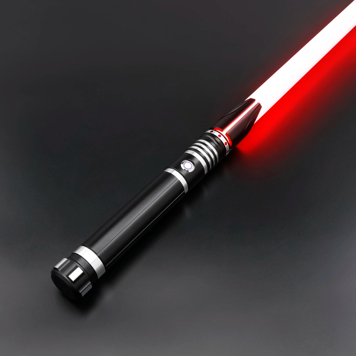 A black lightsaber with a red glowing blade is shown diagonally on a dark surface.