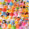 A collection of colorful rubber ducks in various shapes and colors used as party favors or bath toys.