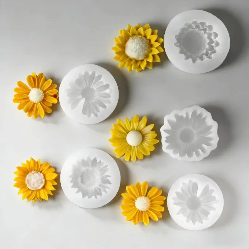 A collection of yellow sunflower silicone molds for candle making and soap crafting, showing various flower shapes.