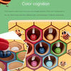 A wooden honeycomb structure showing seven colored bee traps for a Montessori game.